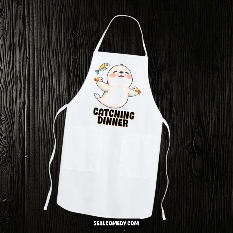 Funny seal juggling fish, printed on a kitchen apron, making culinary tasks more amusing and stylish.