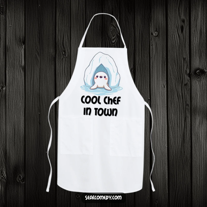 Funny Seal Apron: A curious seal peeking from beneath a floating iceberg, great for a playful cook.