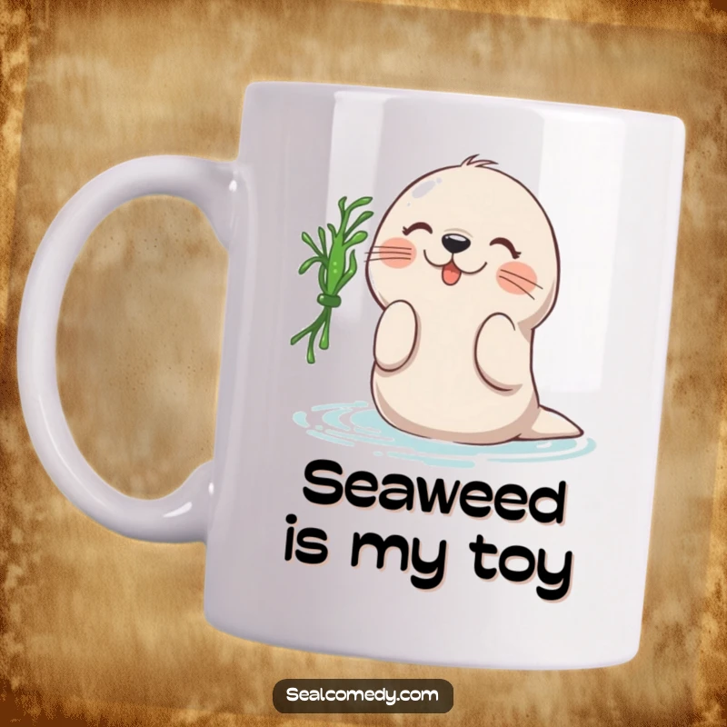 Funny mug illustration of a happy seal playfully batting at a floating piece of seaweed, conveying joy and ocean fun.