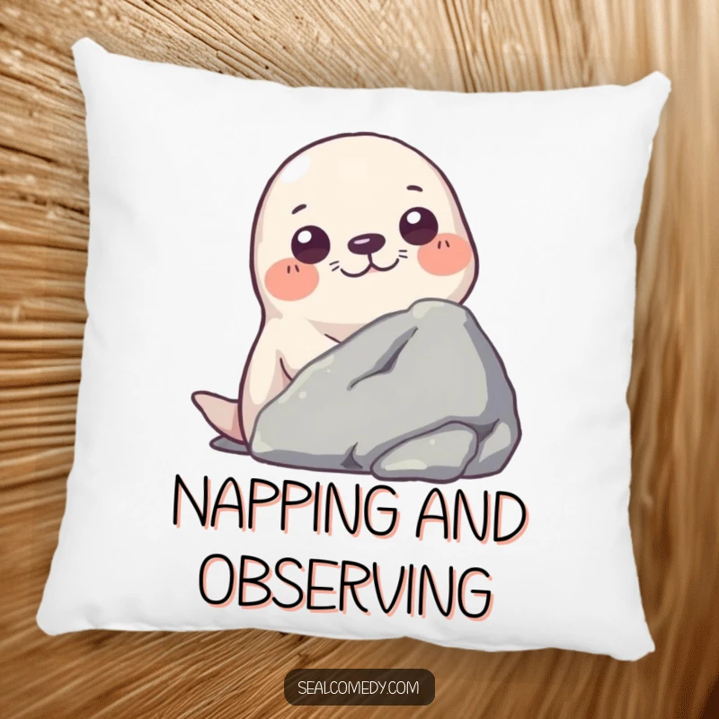 Funny pillow design depicting a seal curiously peeking from behind a rock, adding a touch of playful charm.