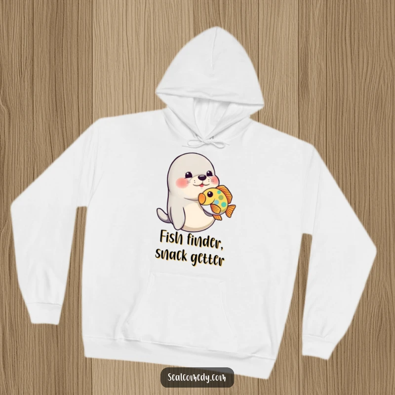 Funny Seal Hoodie: A seal playfully nudges a colorful fish, showcasing humorous underwater friendship.
