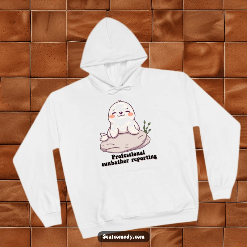 Funny Seal Hoodie: A happy seal with a relaxed expression sunbathes on a rock, embodying humorous leisure.