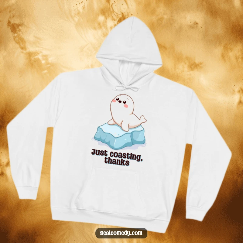 Funny hoodie showcasing a joyful seal character in mid-slide down a small icy slope, perfect for cozy, humorous moments.