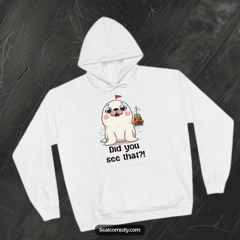 Funny surprised seal hoodie, depicting a seal with wide, shocked eyes observing a boat, a warm and humorous apparel choice.
