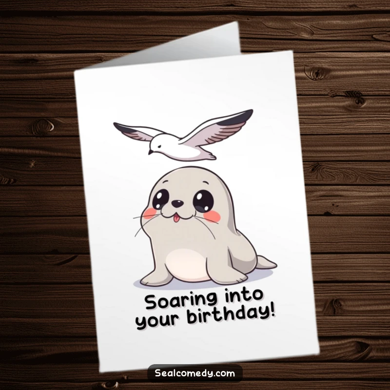 Funny Free Printable Seal Birthday Card: A wide-eyed seal watches a seagull flying in the sky above.