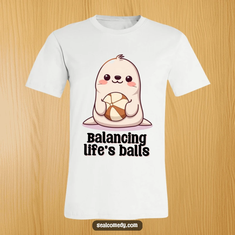 Funny Seal T-Shirt: A smiling, happy seal expertly balances a bright ball on its nose, showcasing pure delight.