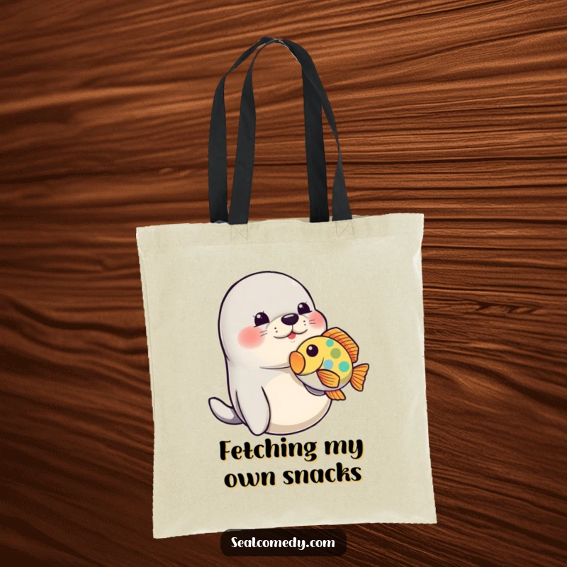 Funny Seal Tote Bag: A playful seal nudging a fish, a humorous and practical accessory for ocean lovers.