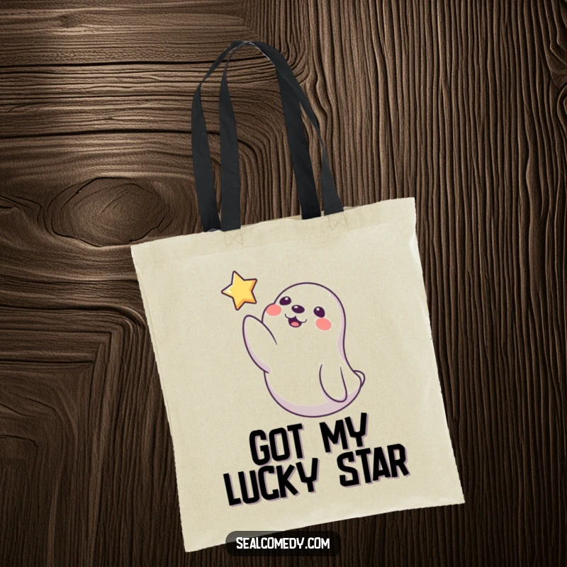 Funny Seal Tote Bag: A playful seal reaches a flipper towards a twinkling star, representing dreams and a whimsical journey.