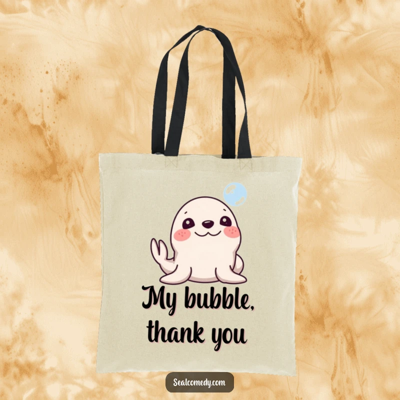 Funny Seal Tote Bag: A seal with a silly smile honking its nose at a bubble. Practical and humorous, a great funny gift.